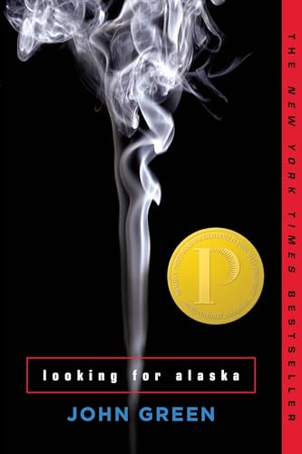 Book cover for "Looking for Alaska" by John Green, featuring white smoke rising on a black background with a gold award emblem and a red vertical banner reading "The New York Times Bestseller.
